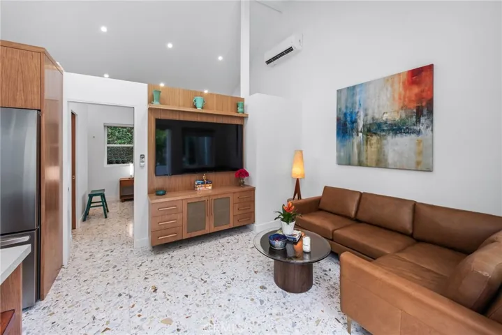 lLiving room with master bedroom in view