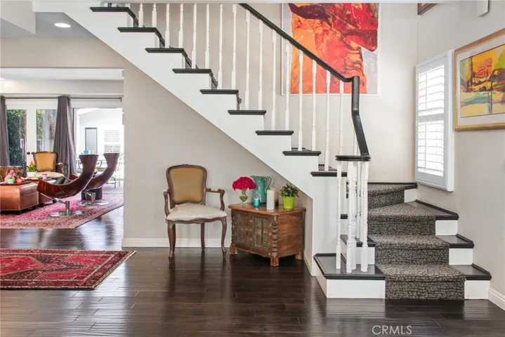 stairway leading to 3 bedrooms