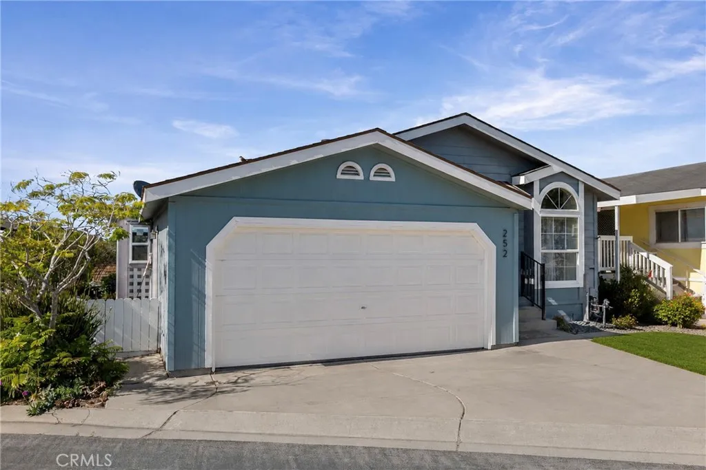 Front of Home with 2 Car Garage Attached