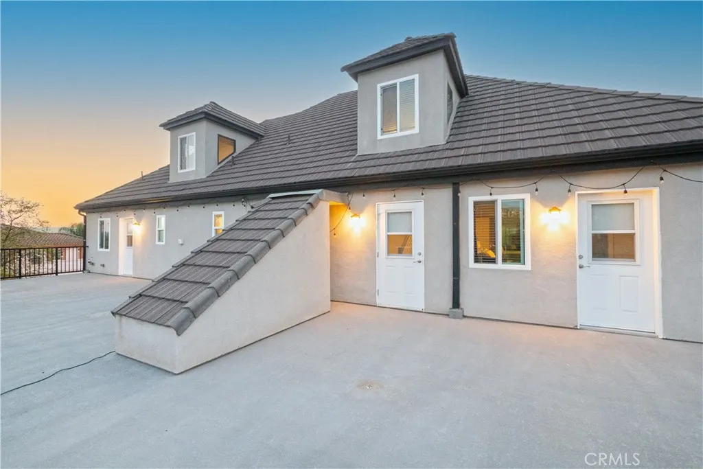 Take balcony stairs down to lower patio if desired