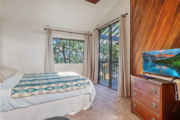 High ceilings in both bedrooms. Screen image digitally simulated.