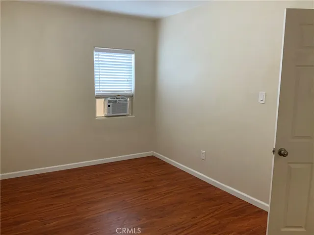 Bedroom No. 1 --- Master Suite with Window Air Conditioner and Bath & Shower.
