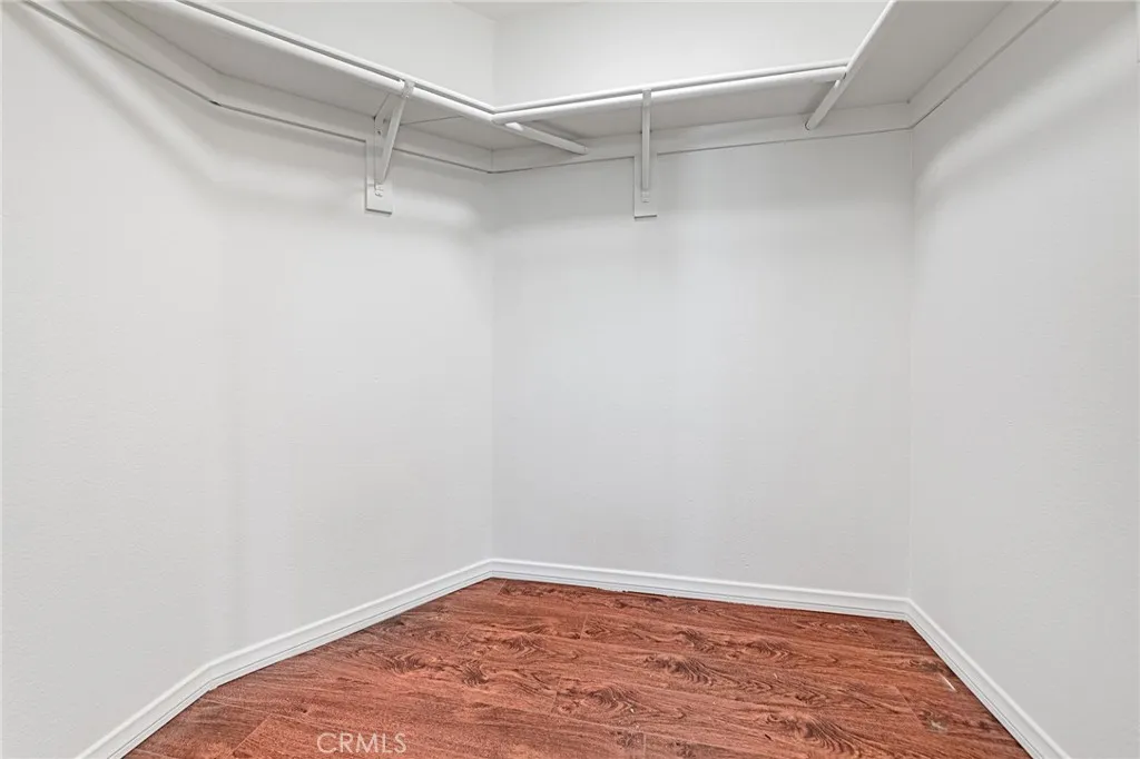 Spacious walk-in closet offering ample storage space