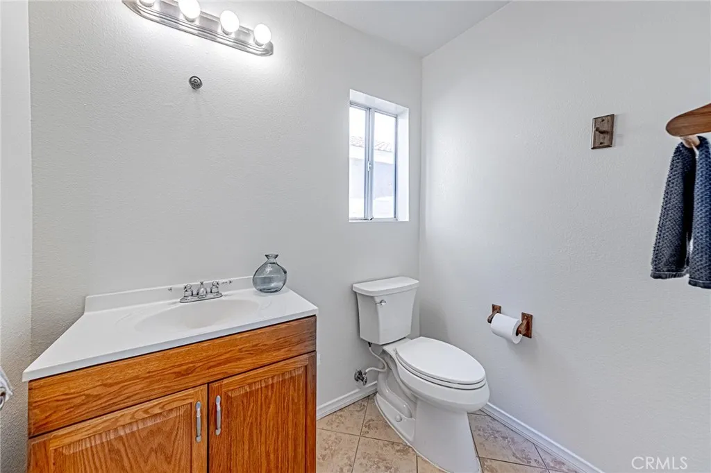 Generously sized half bathroom on the main level