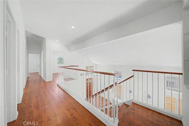Spacious upstairs hallway with an open layout