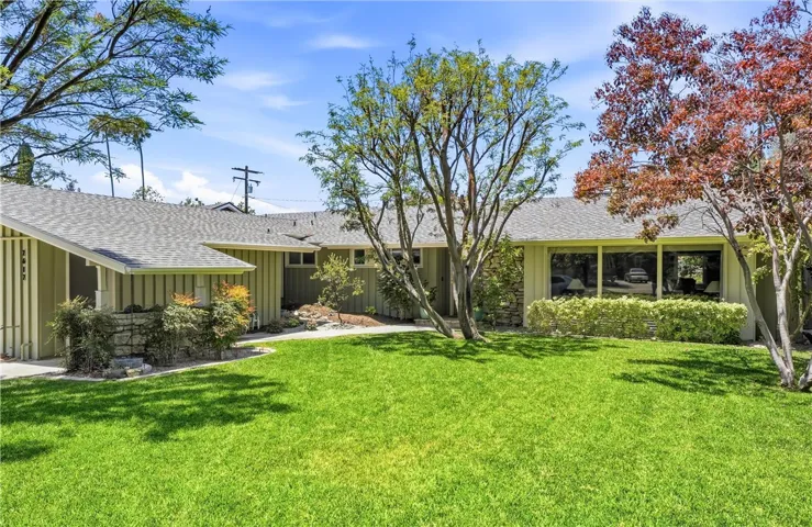 A stunning mid-century home in Morrison Park - which is adjacent to Floral Park and Fisher Park - with its original character enhanced by thoughtful updates.
