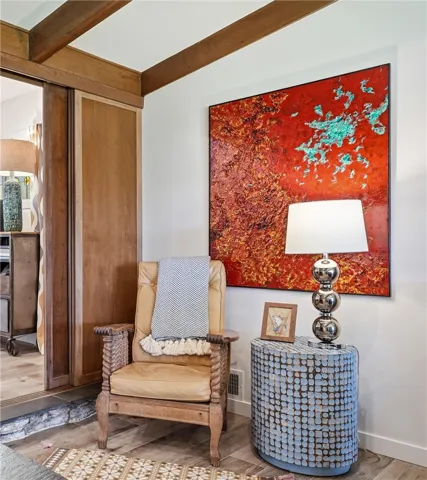 The wood panels to the left can be closed to keep the living room cozy.