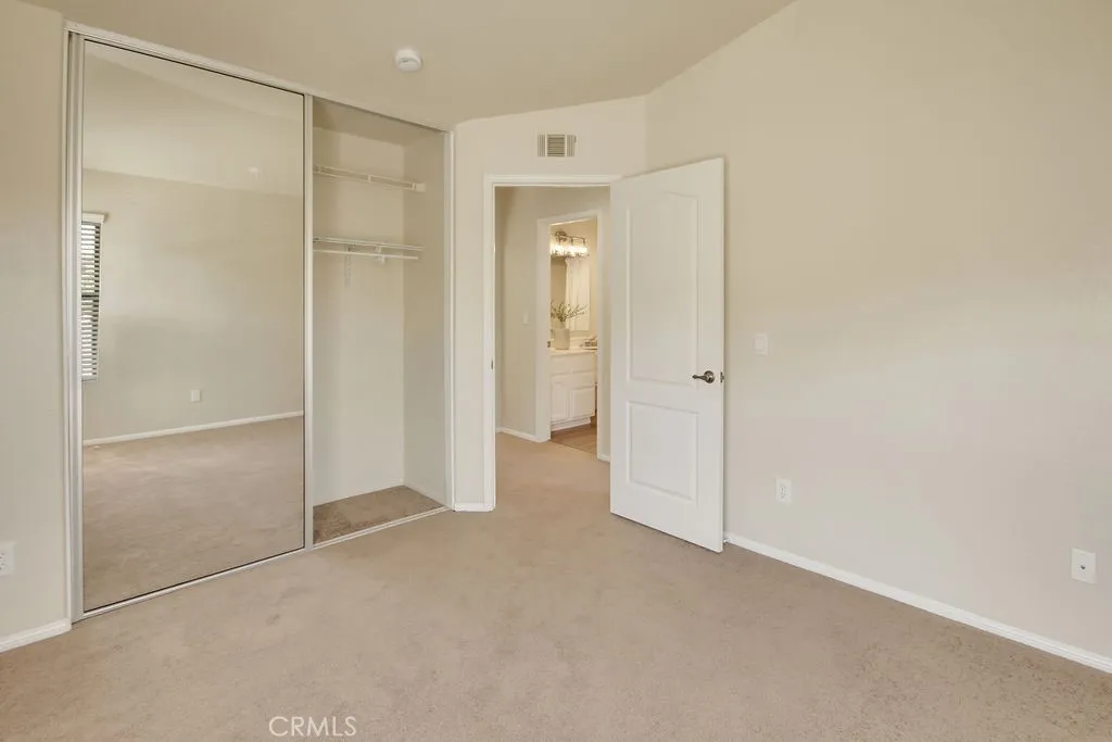 Generous closet space and convenient access to the full bathroom make this 3rd bedroom ideal for guests or family members.