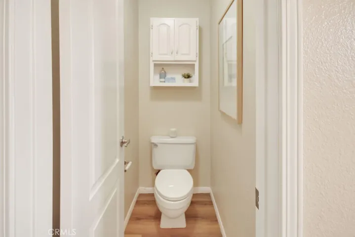 The primary bathroom includes a separate enclosed water closet for added privacy and everyday convenience.