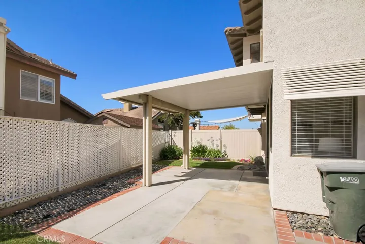 Relax or entertain year-round under the spacious covered patio overlooking the private backyard.
