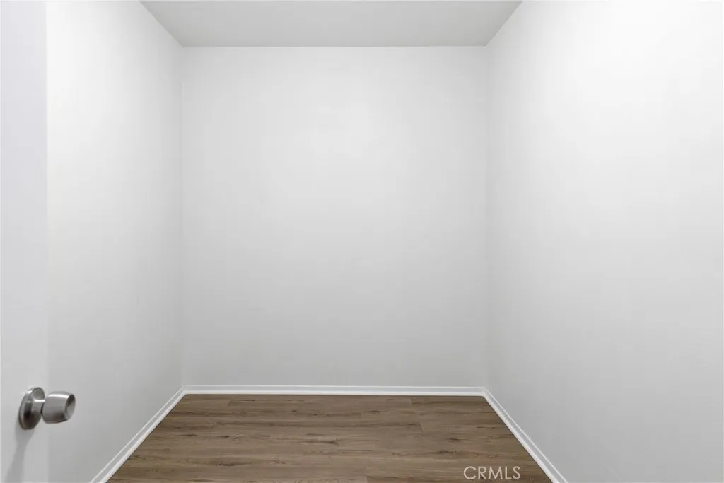 Primary bedroom walk-in closet