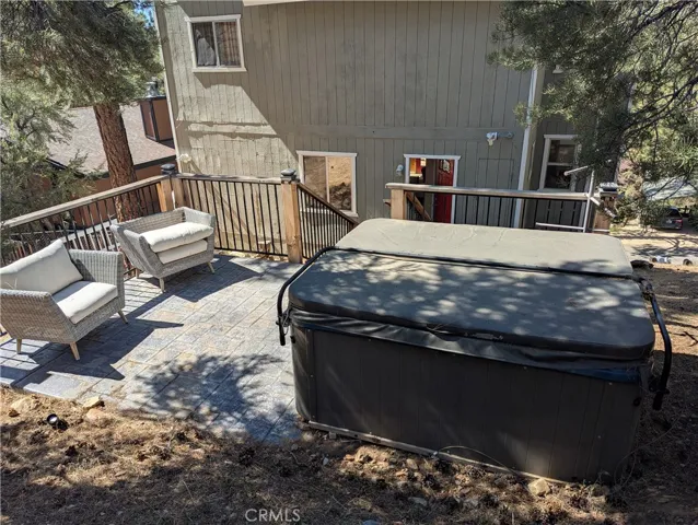 Seating area near hot tub.