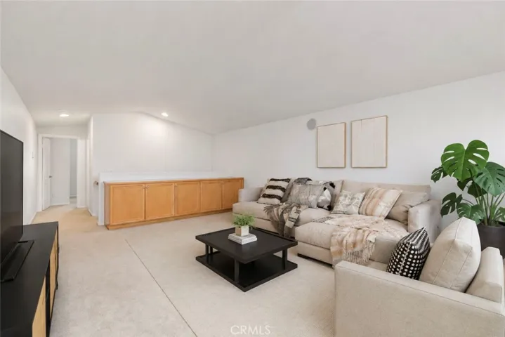 Virtually staged upstairs loft area