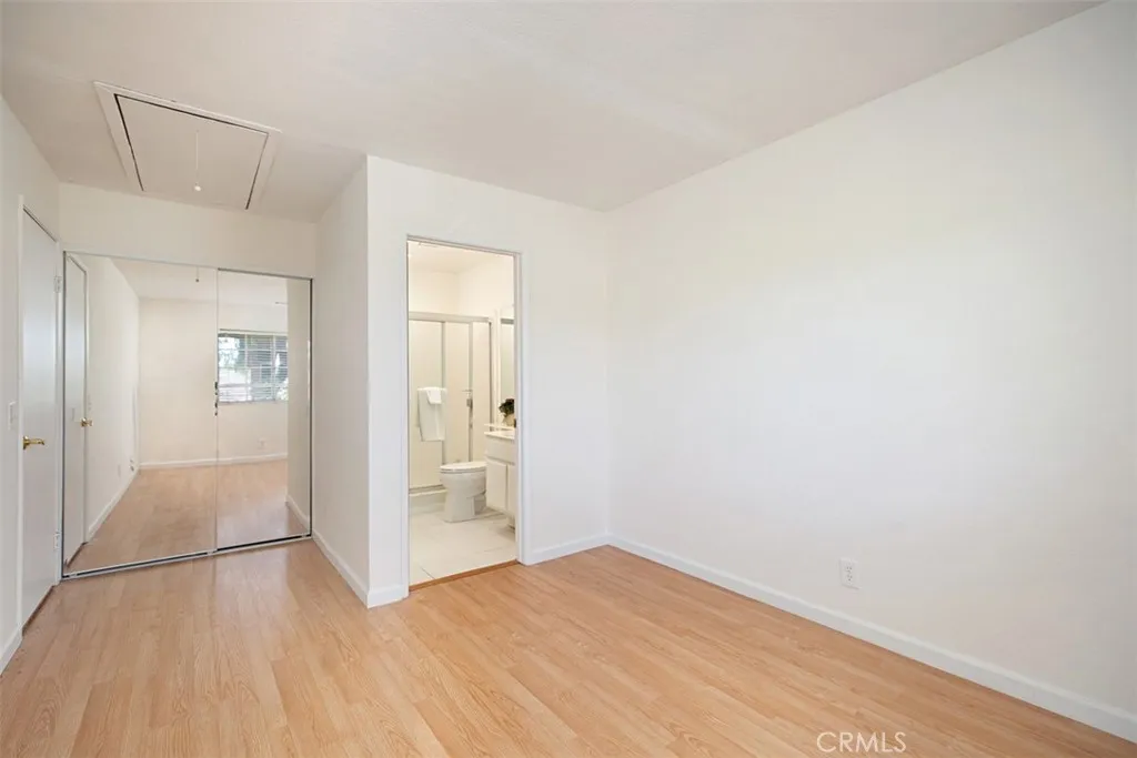 Secondary Bedroom, additional view. Bathroom has since been remodeled.
