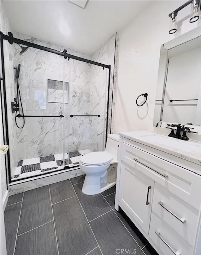 Remodeled secondary bathroom. LVP floors