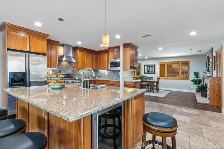 Kitchen with center island and seating