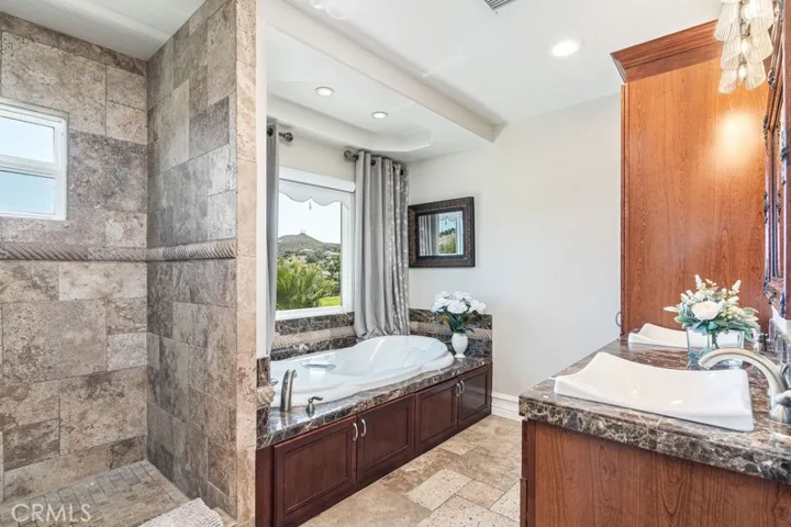 Primary bathroom suite with walk in shower