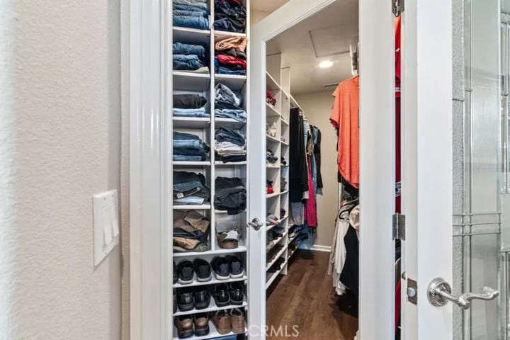 Walk in closet with built in shelving
