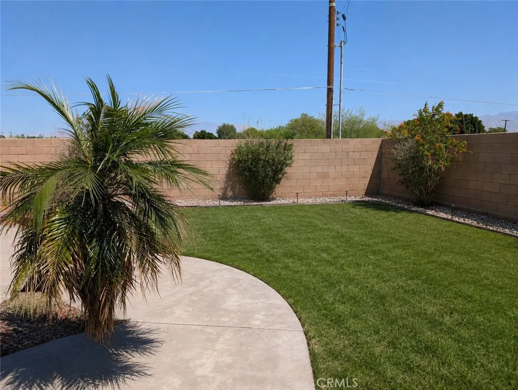 Image has been digitally enhanced to showcase what the backyard can potentially look like.  The backyard and pool and spa are in need of repair.
