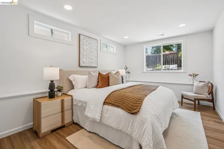 Bright spacious primary bedroom in lower level.