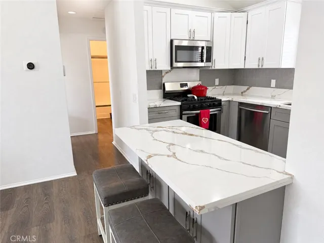 Quartz counters and soft closed cabinets and drawers,.