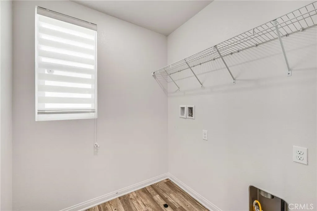 Dedicated laundry room on top floor