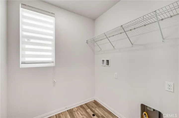 Dedicated laundry room on top floor