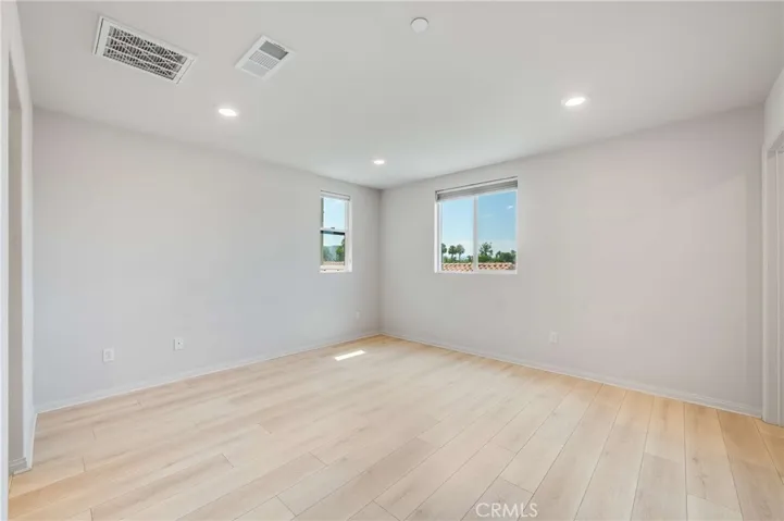 Primary bedroom with hill view
