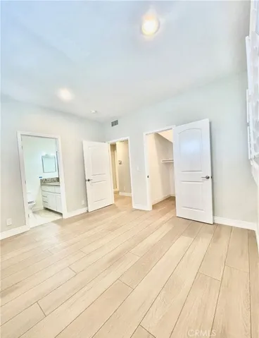 Master bedroom with walk-in closet
