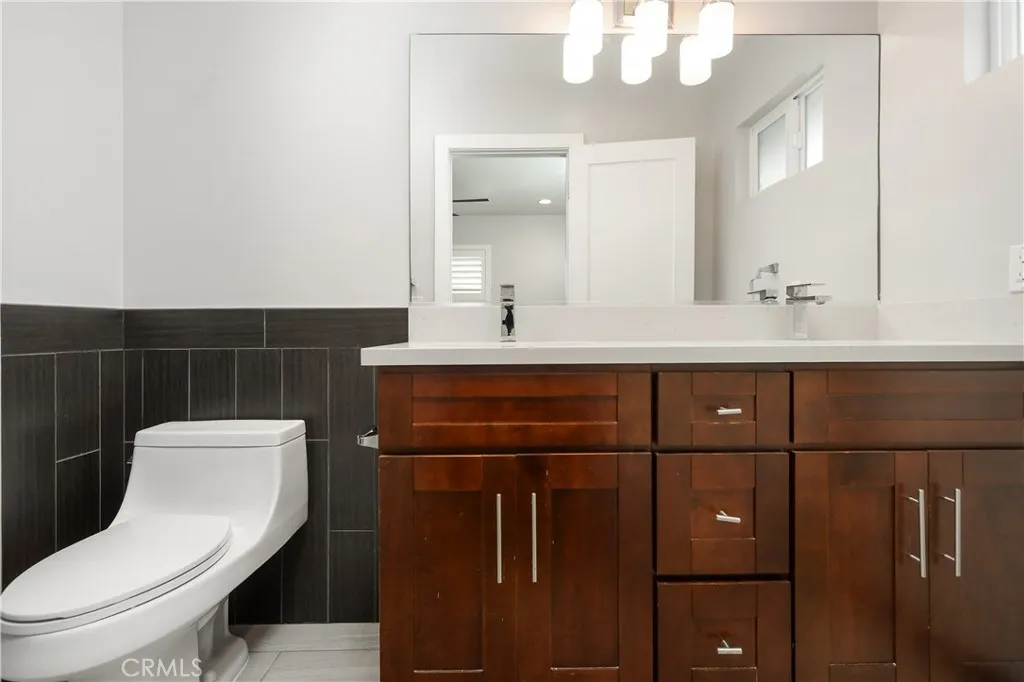 Primary Bath with glass shower enclosure & dual sinks