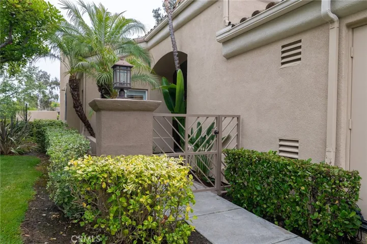 Gated front courtyard.