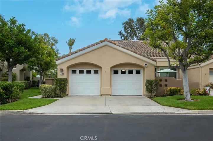 The home has a two-car garage with a driveway.