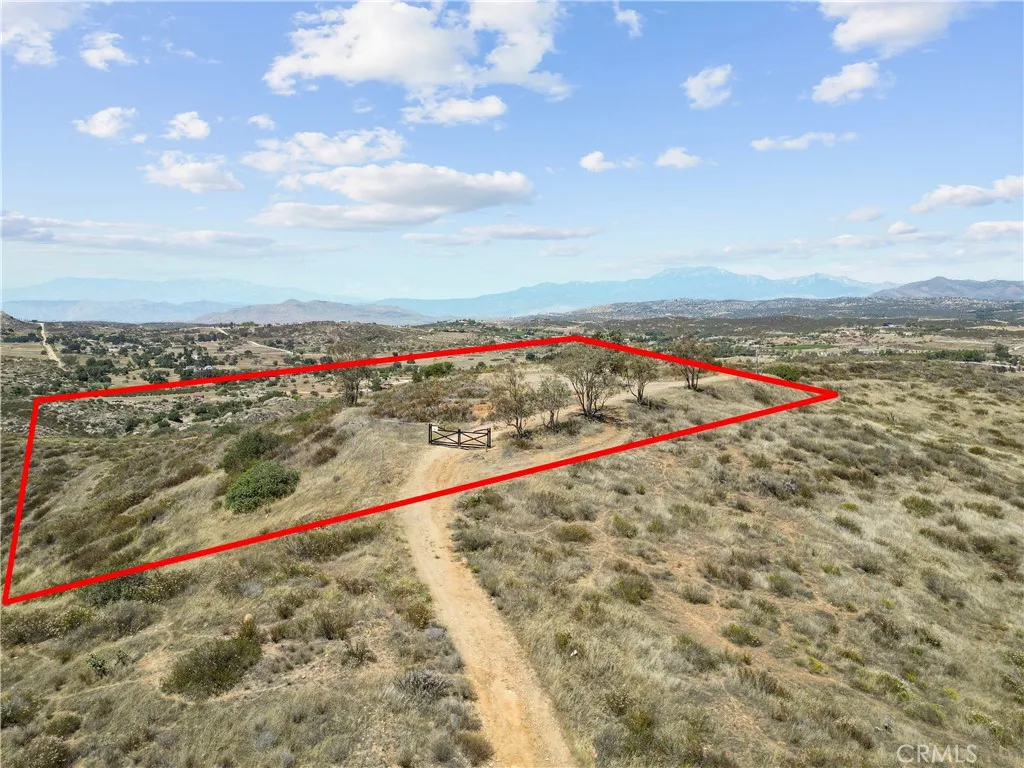 Approximate lot lines have been added to photos for reference only and are not intended to represent exact property boundaries. Buyers are advised to verify all property lines and dimensions independently.