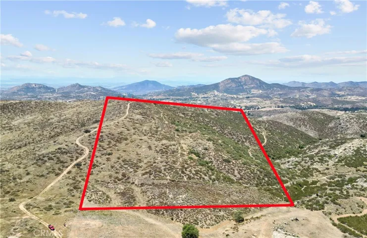Approximate lot lines have been added to photos for reference only and are not intended to represent exact property boundaries. Buyers are advised to verify all property lines and dimensions independently.