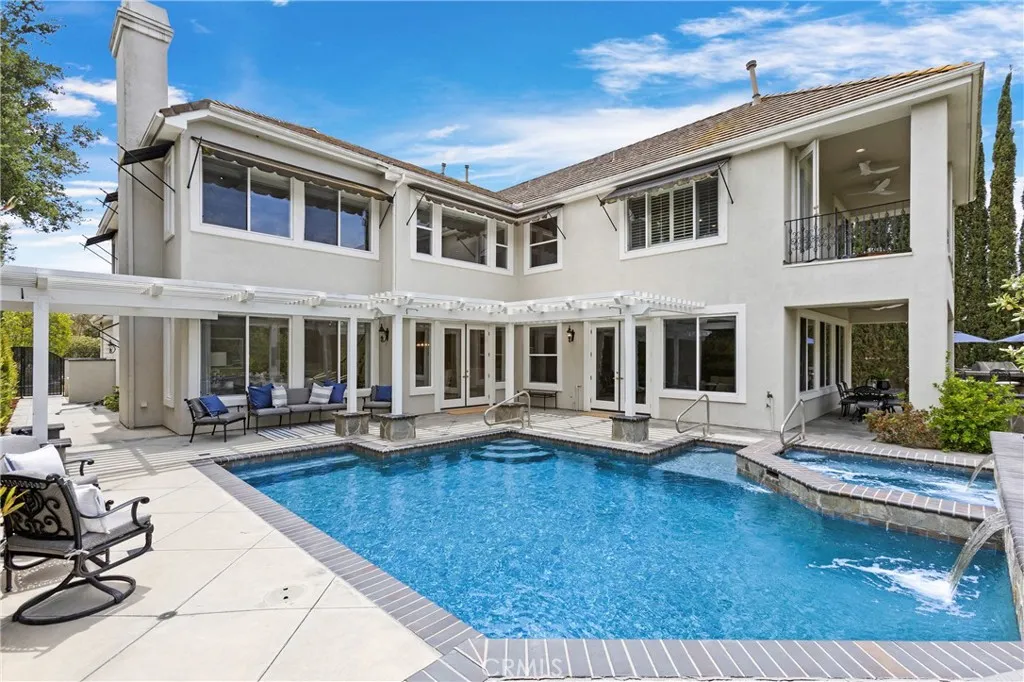 Expansive home with a stunning salt water pool,  with newer pool heater and featuring tons of room to entertain