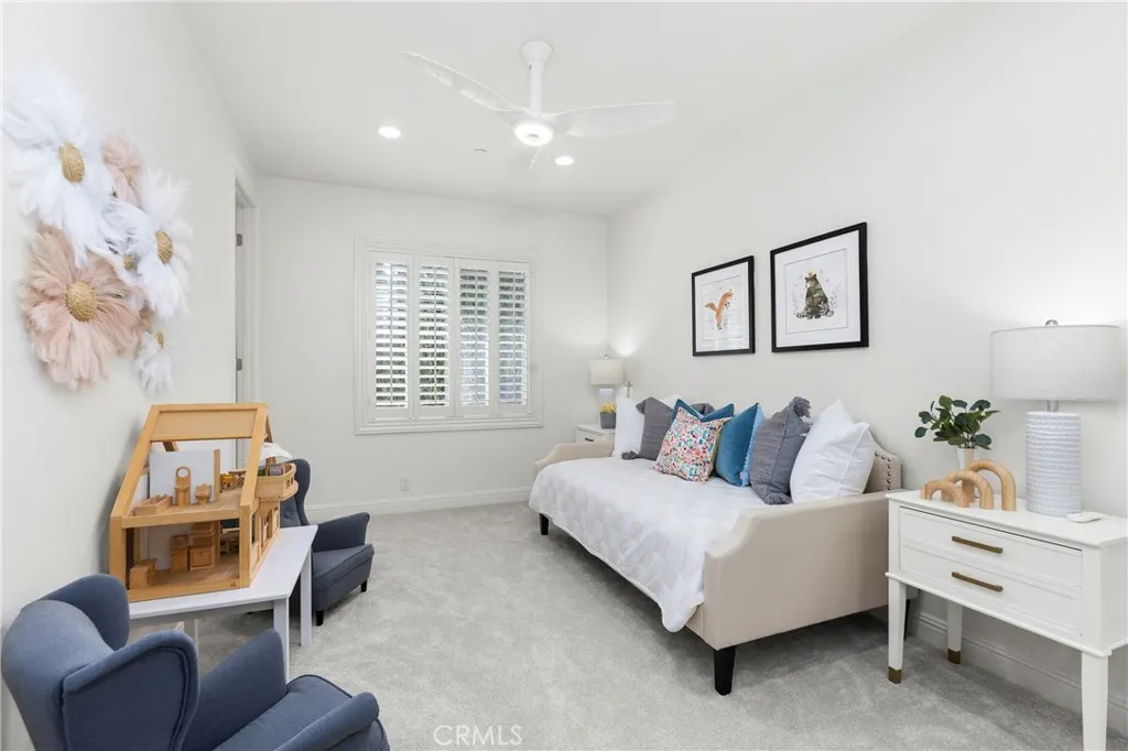 Bedroom 5-Bright and airy bedroom featuring natural light thru the plantation shutters, lots of storage and direct access en-suite bath