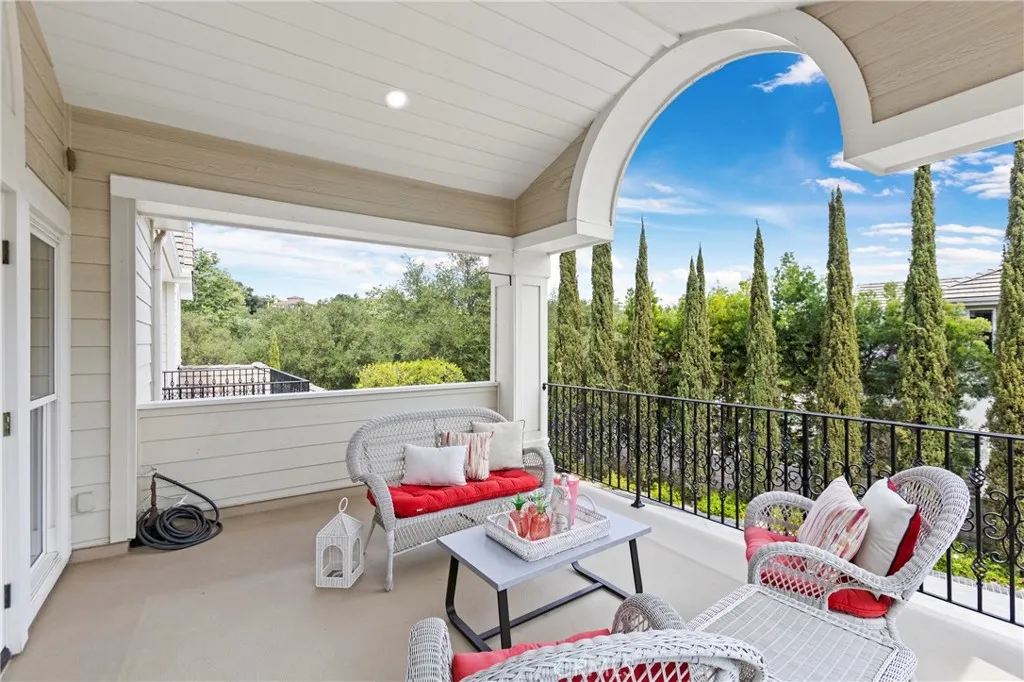 Bedroom 4-Relax on this spacious balcony, offering scenic views and comfortable seating for gatherings or quiet moments.
