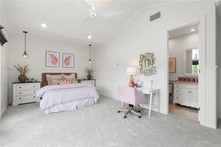 Bedroom 4-Spacious bedroom with soft carpeting, modern fixtures, and a dedicated workspace offering delightful natural light.