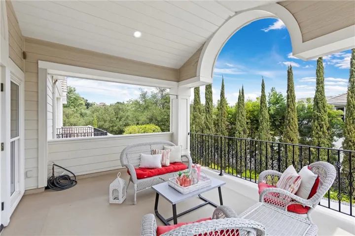 Bedroom 4-Relax on this spacious balcony, offering scenic views and comfortable seating for gatherings or quiet moments.