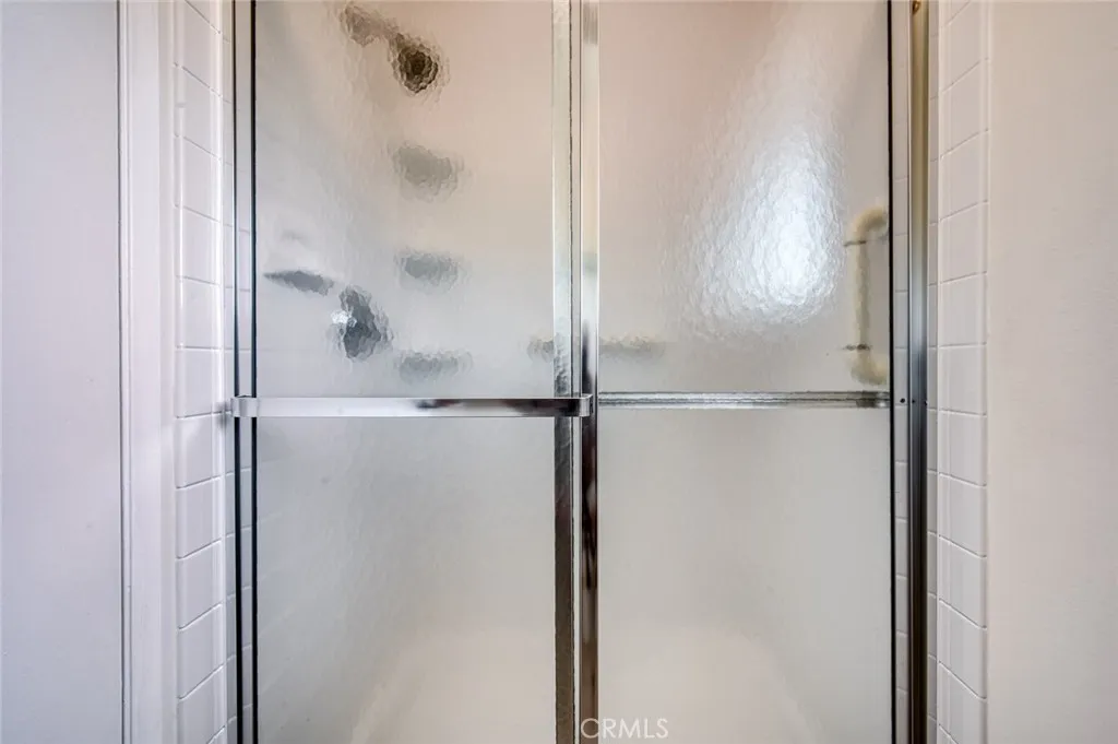En-suite bathroom shower for primary bedroom.
