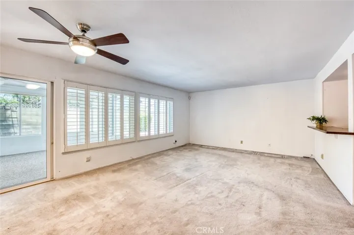 Spacious family room with easy access to sun/screen room.