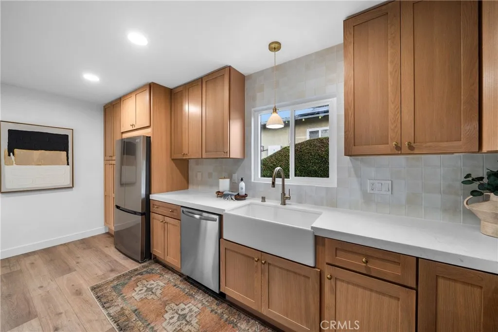 Beautiful Tile and Backsplash Stainless Steel Appliances included