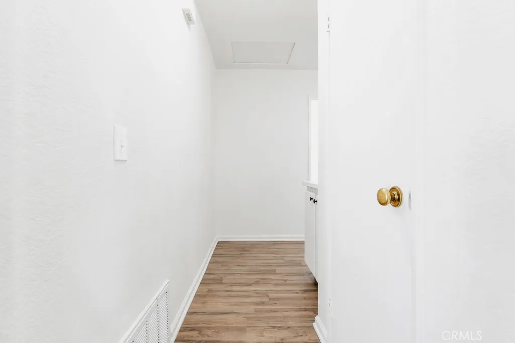 hallway to bedrooms and bathrooms