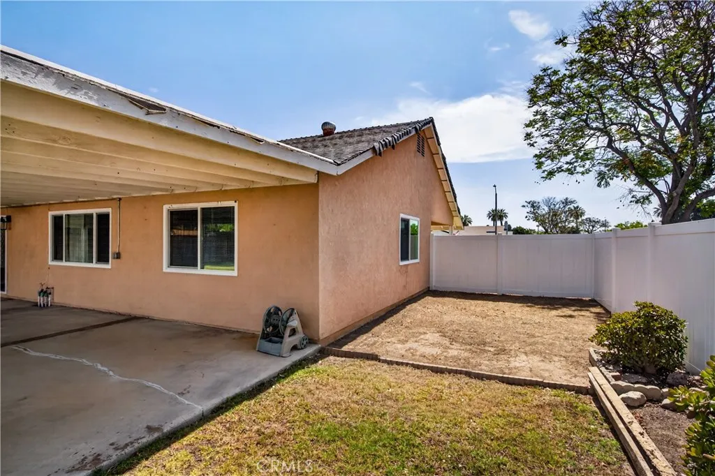 Large side yard can be used for storage or a second RV