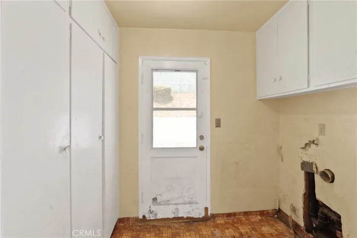 Laundry room with extra storage/pantry space