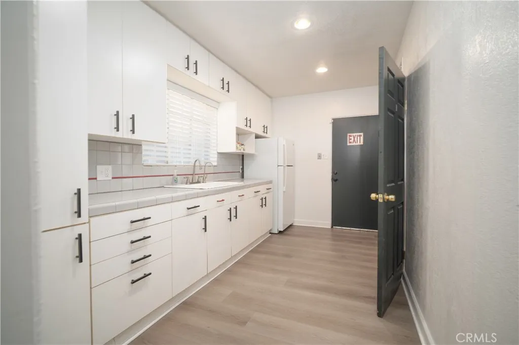 Kitchen with exit to parking lot