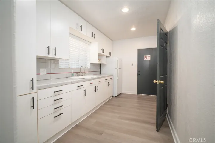 Kitchen with exit to parking lot