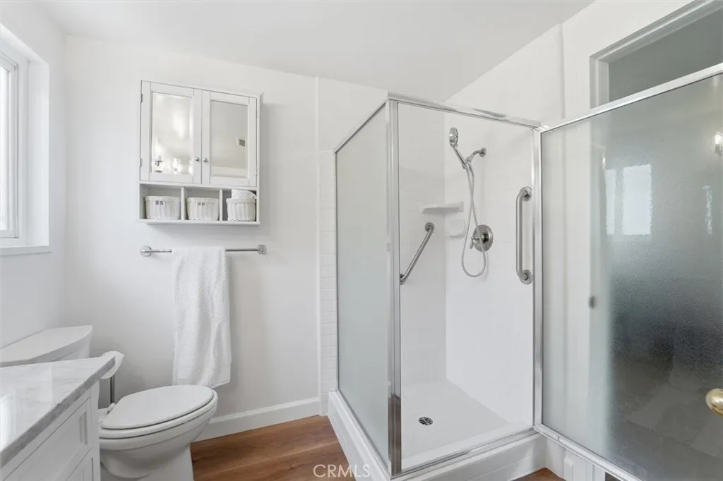 Primary bath shower and cabinet