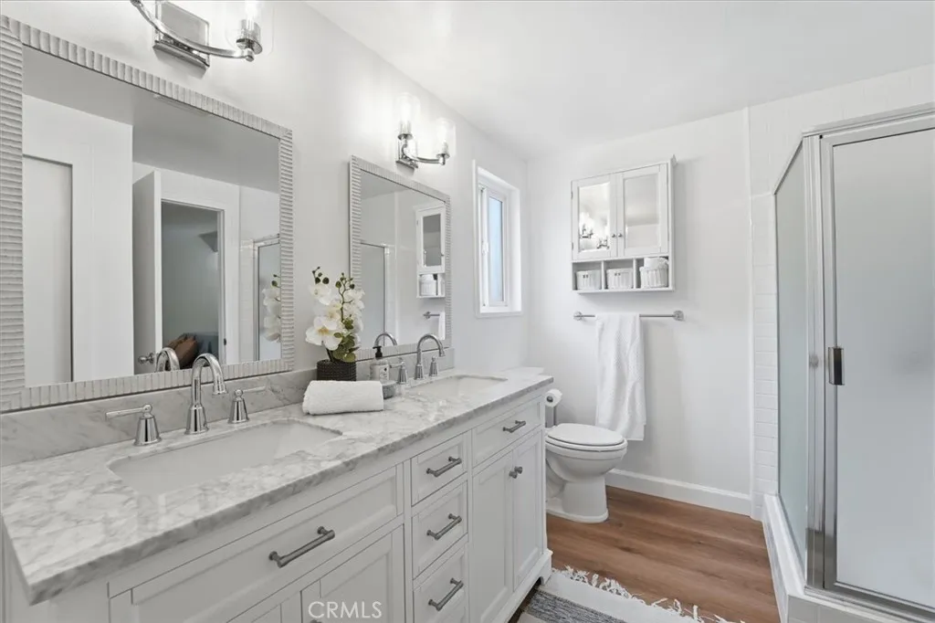 Primary bath with new vanity, mirrors and lights