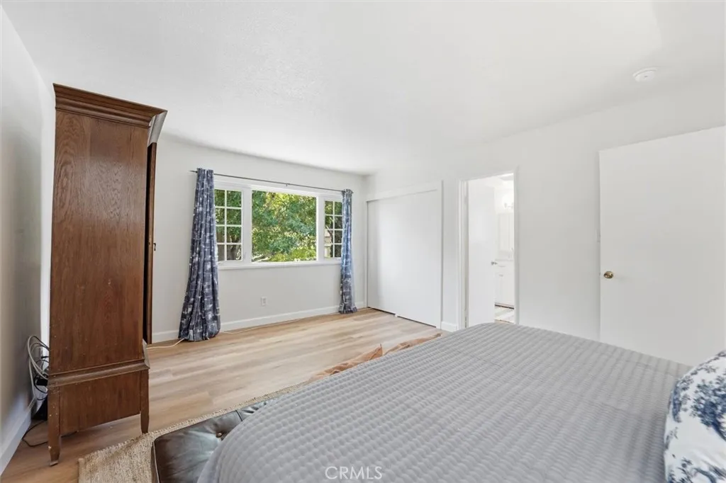 Primary bedroom with large picture window